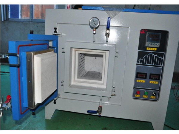Controlled-atmosphere chamber furnace with open gasketed door, pressure gauge, external valves and side control panel